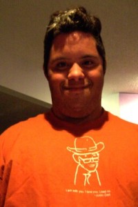 Teddy wearing the original Texas Orange Justin Dart Shirt
