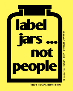 Yellow shirt with an outline of a black jar with the words "Label Jars... Not People comes in adult and children's sizes, including a  few long sleeved shirts.  We carry a leaner women's cut in lavender - size small- 2x.