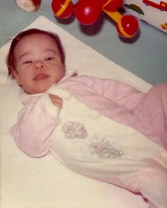 Teddy dressed in a pink Beatrix Potter pj